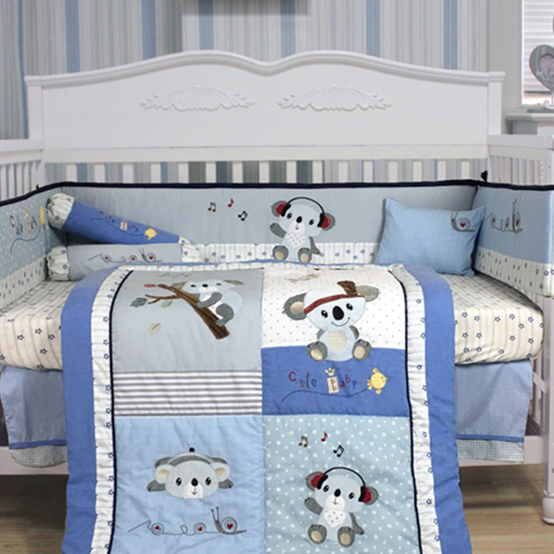 Juego de cama tipo cuna con estampado de animales azules para bebés